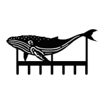 A black, steel key rack featuring the silhouette of a humpback whale with seven hooks at the bottom.